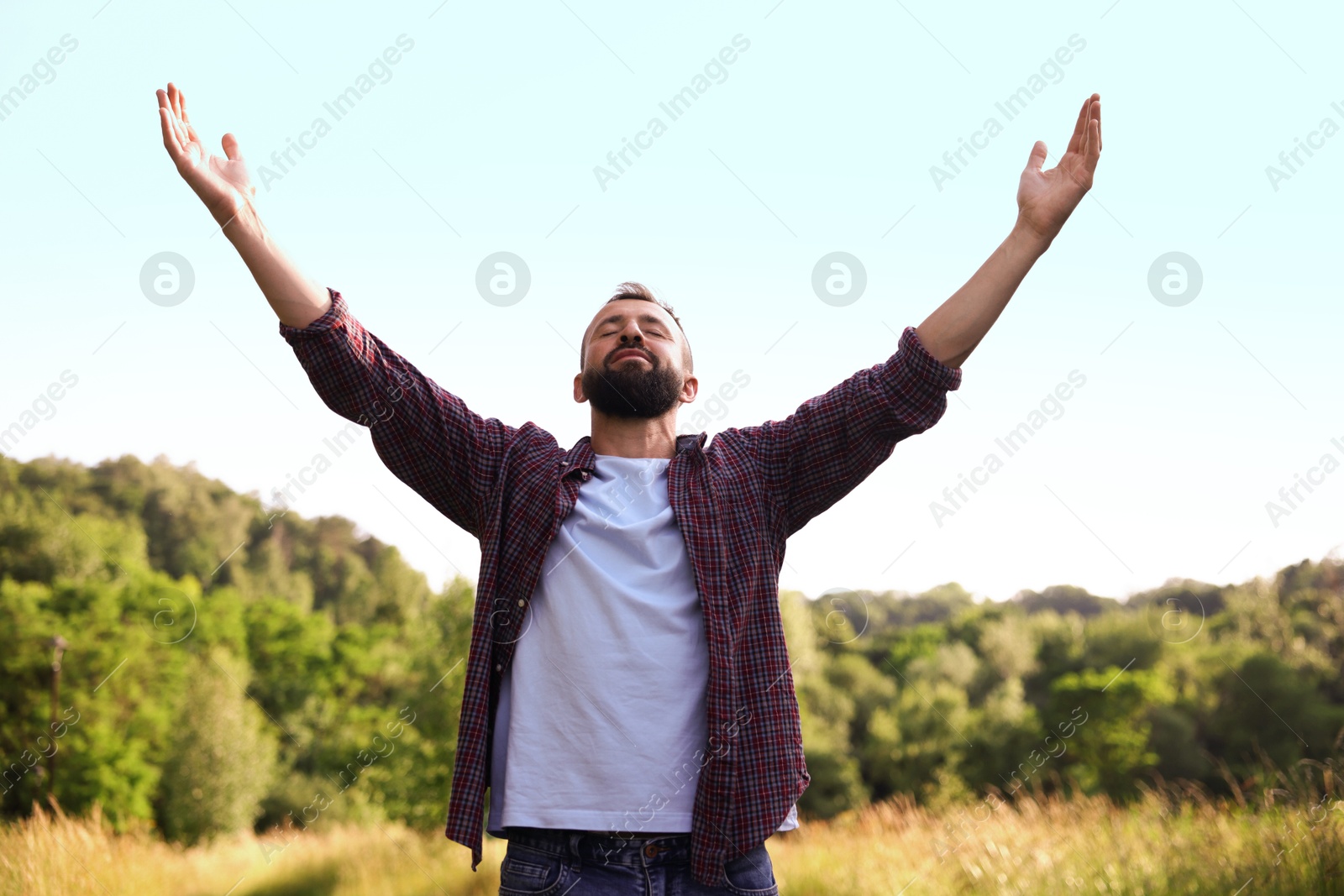 Photo of Feeling freedom. Happy man enjoying time outdoors