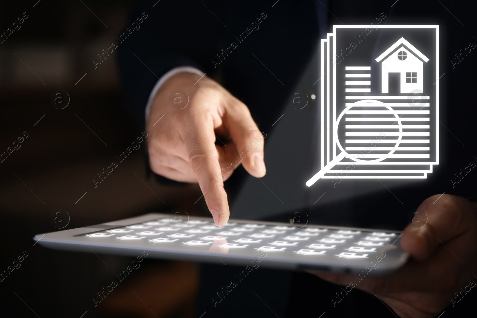 Real estate agent using tablet computer, closeup. House data and magnifying glass on virtual screen Image of Real estate agent using tablet computer, closeup. House data and magnifying glass on virtual screen