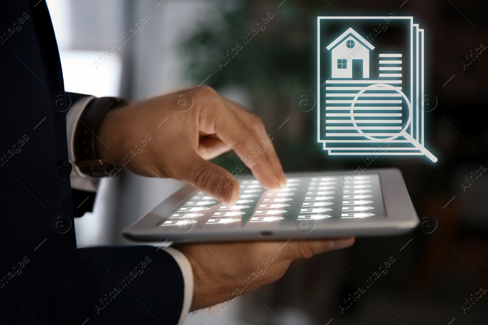 Real estate agent using tablet computer, closeup. House data and magnifying glass on virtual screen Image of Real estate agent using tablet computer, closeup. House data and magnifying glass on virtual screen
