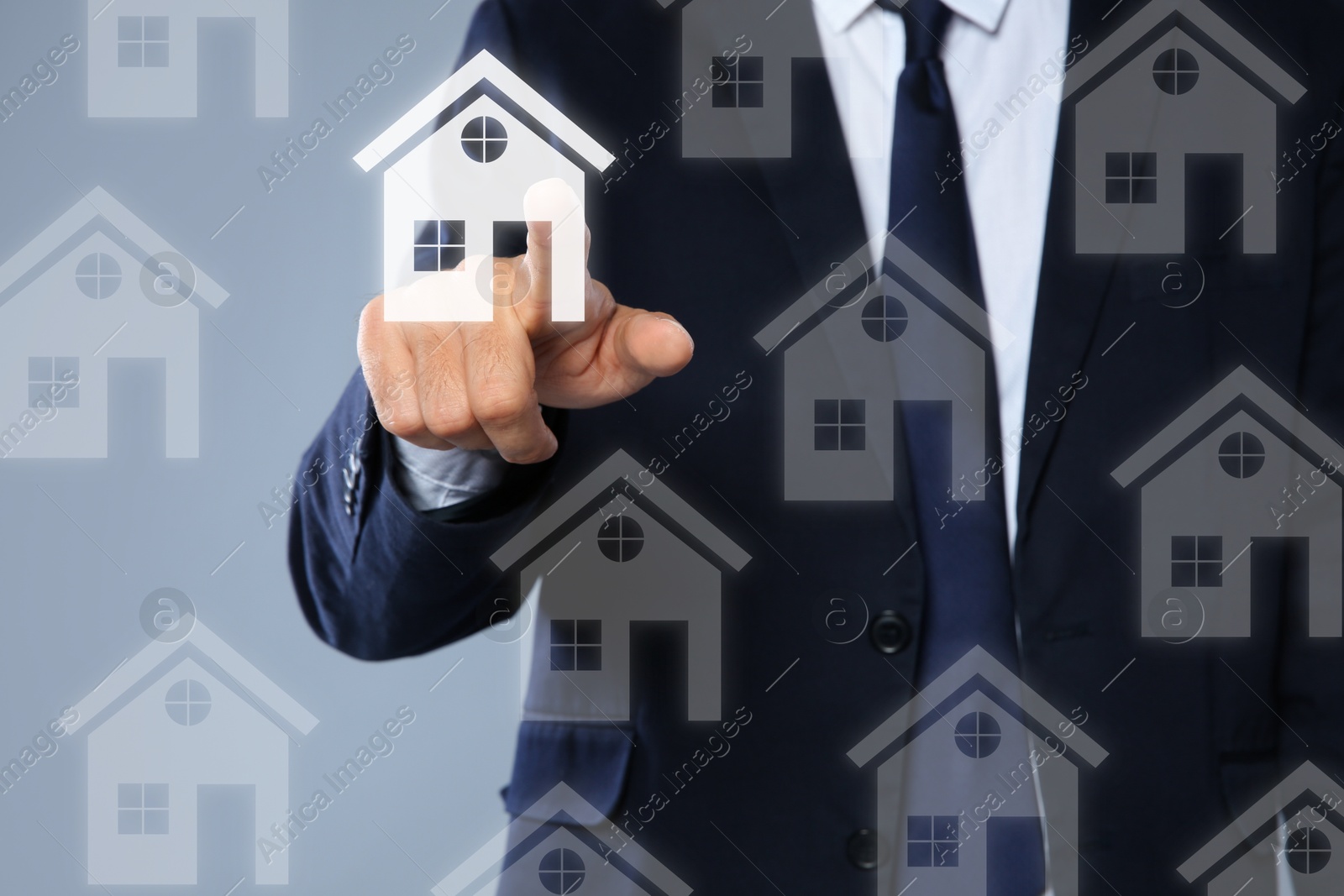 Real estate agent choosing house on virtual screen against grey background, closeup Image of Real estate agent choosing house on virtual screen against grey background, closeup