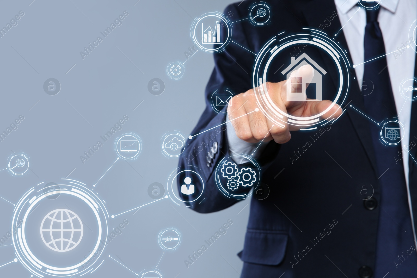 Real estate agent using virtual screen with icons and schemes against grey background, closeup Image of Real estate agent using virtual screen with icons and schemes against grey background, closeup