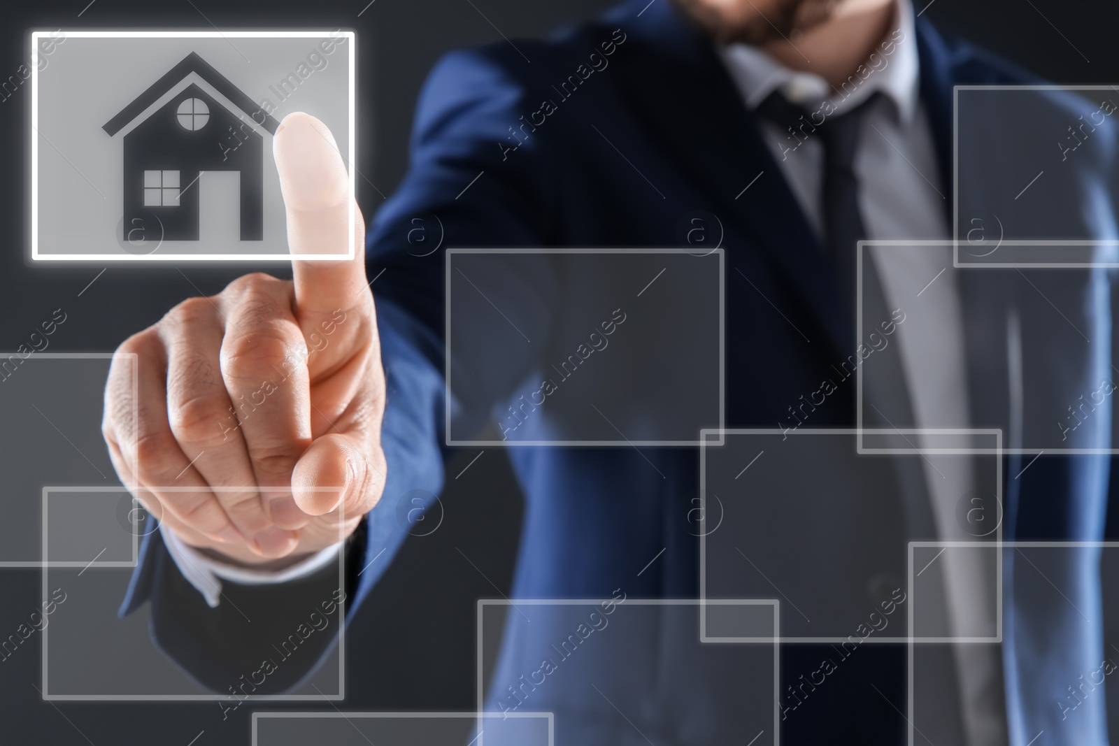 Image of Real estate agent choosing house on virtual screen against grey background, closeup