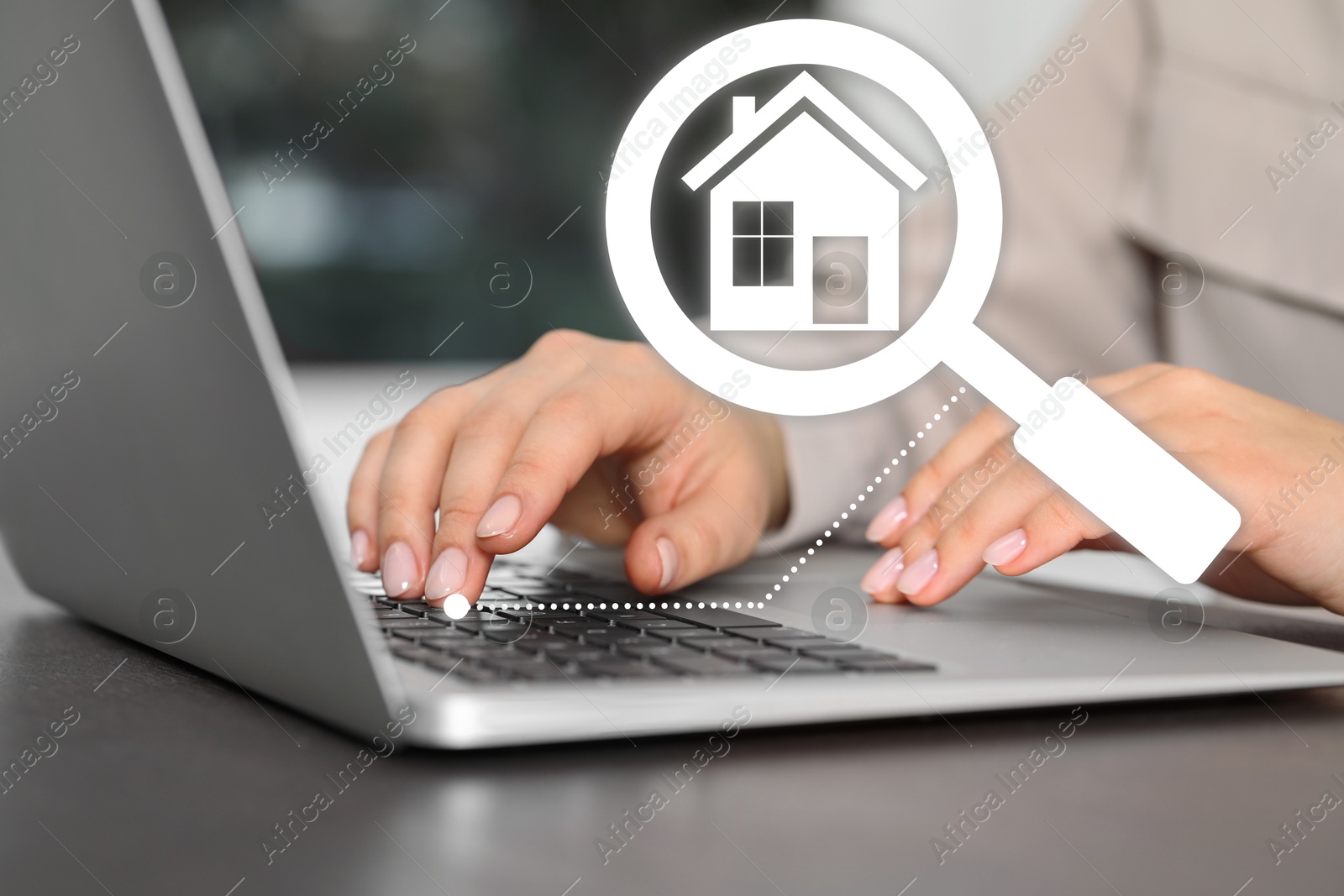 Real estate agent using laptop at table, closeup. Magnifying glass with house icon on virtual screen Image of Real estate agent using laptop at table, closeup. Magnifying glass with house icon on virtual screen