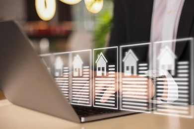 Image of Real estate agent using laptop at table, closeup. Database on virtual screen