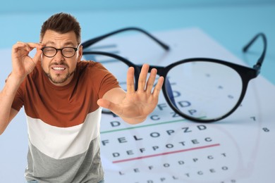 Image of Man with eyesight problems, glasses and vision test chart on light blue background
