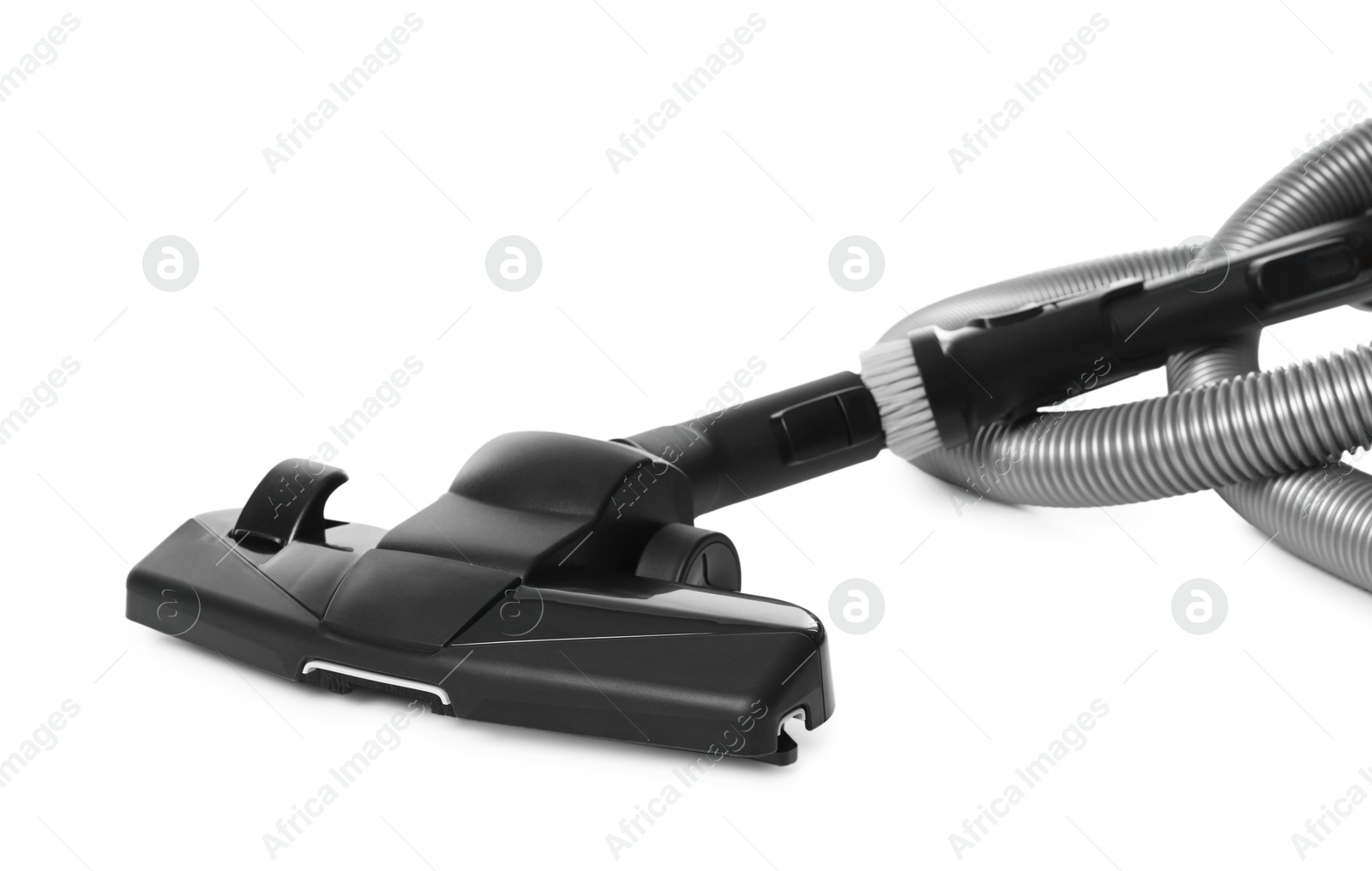 Vacuum cleaner brush and hose on white background Photo of Vacuum cleaner brush and hose on white background