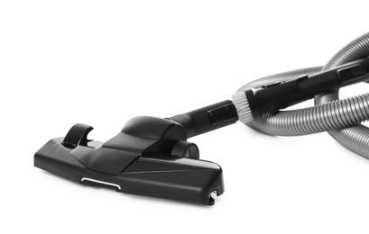 Photo of Vacuum cleaner brush and hose on white background