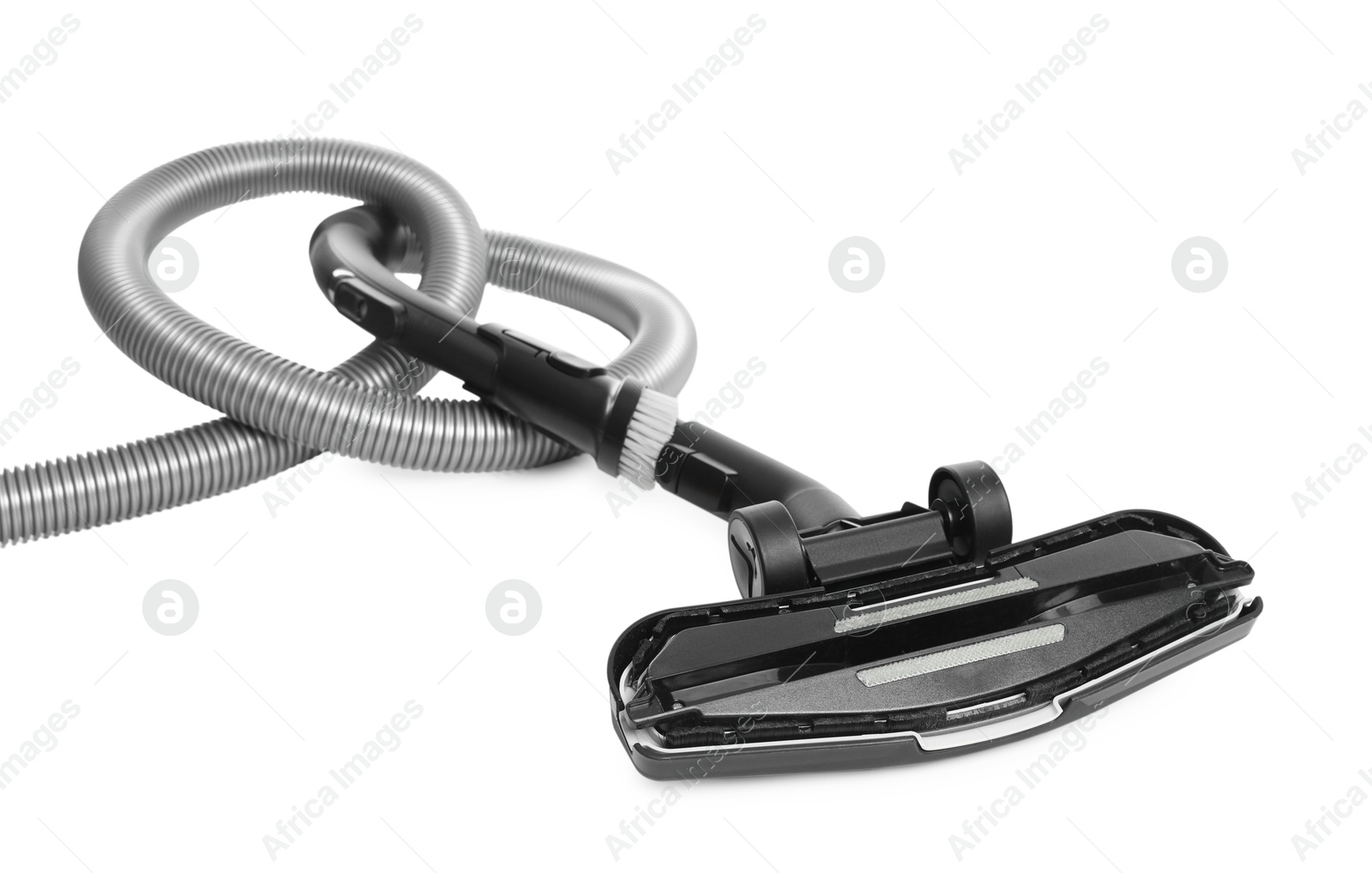 Vacuum cleaner brush and hose on white background Photo of Vacuum cleaner brush and hose on white background