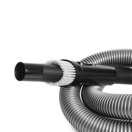 Photo of Vacuum cleaner brush and hose on white background