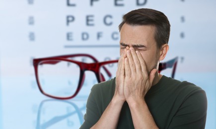 Image of Man with eyesight problems, glasses and vision test chart. Banner design
