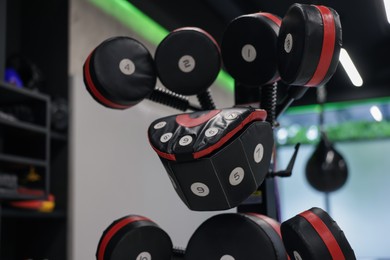 Photo of Boxing equipment in professional gym, closeup view