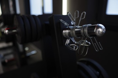 Photo of Dumbbells and other equipment in gym, closeup