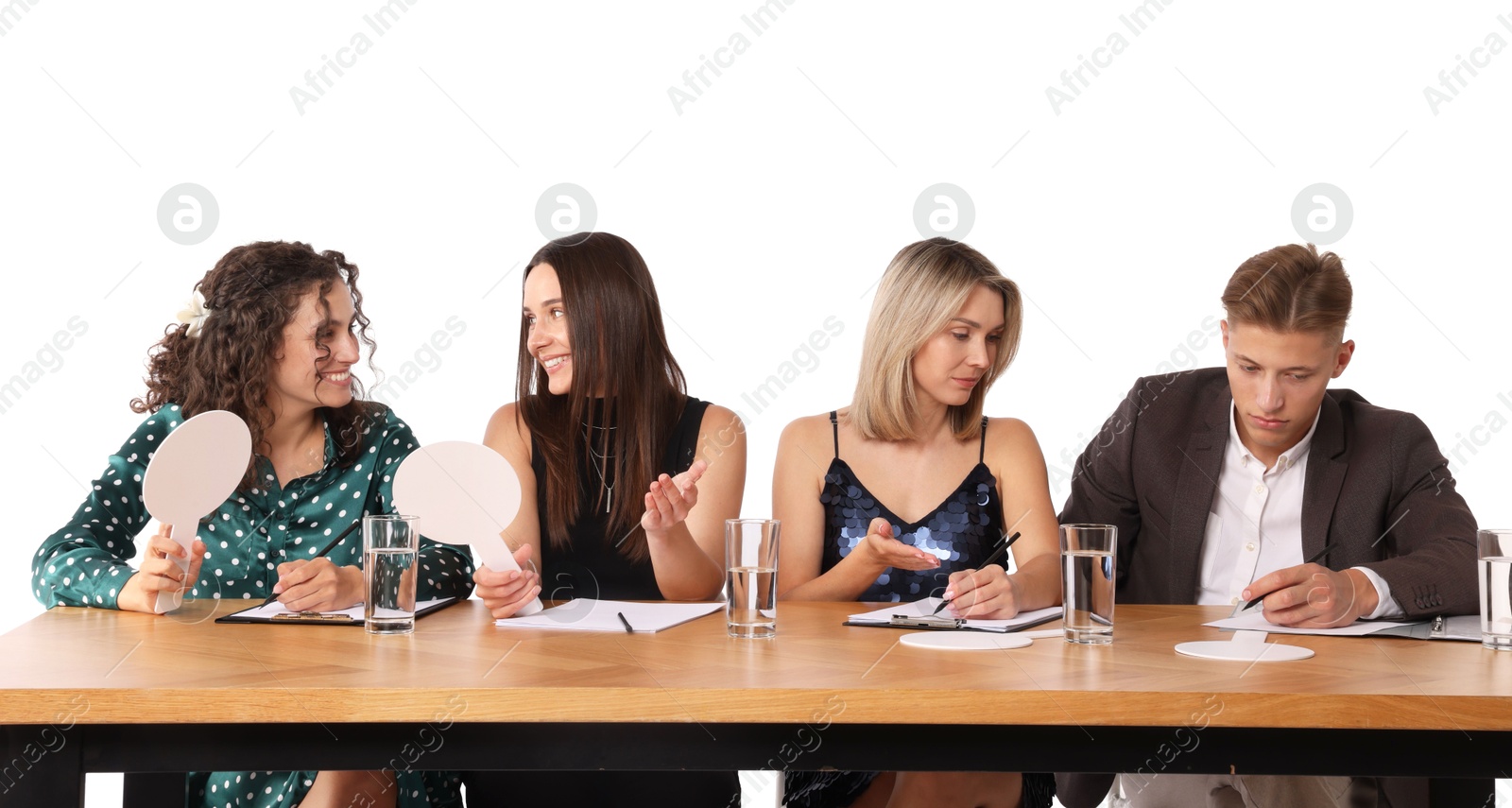 Panel of judges consulting at table on white background Photo of Panel of judges consulting at table on white background