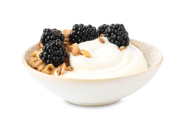 Photo of Tasty yogurt with granola and blackberries in bowl isolated on white
