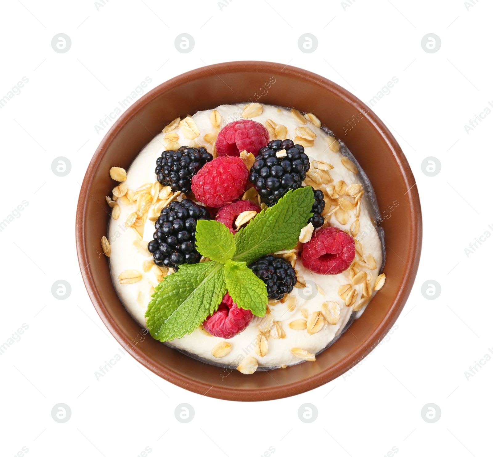 Tasty yogurt with granola and berries in bowl isolated on white, top view Photo of Tasty yogurt with granola and berries in bowl isolated on white, top view