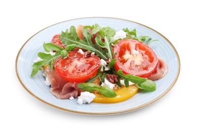 Photo of Tasty salad with arugula, cheese, tomatoes, nuts and prosciutto isolated on white
