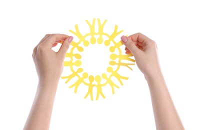 Photo of Woman holding paper figures of people on white background, closeup