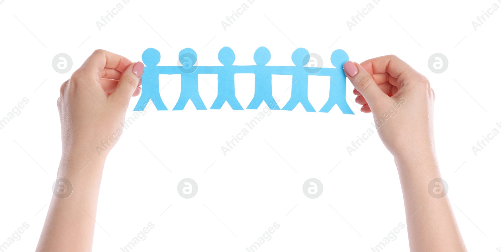 Photo of Woman holding paper figures of people on white background, closeup
