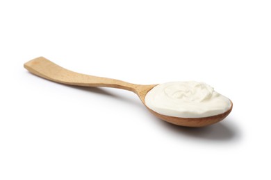 Photo of Delicious sour cream in spoon isolated on white