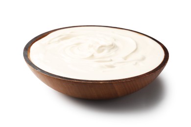 Photo of Delicious sour cream in wooden bowl isolated on white