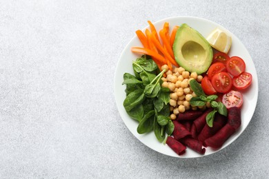 Photo of Different healthy vegetarian food on light grey table, top view. Space for text