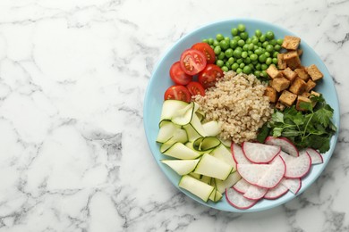 Photo of Different healthy vegetarian food on white marble table, top view. Space for text