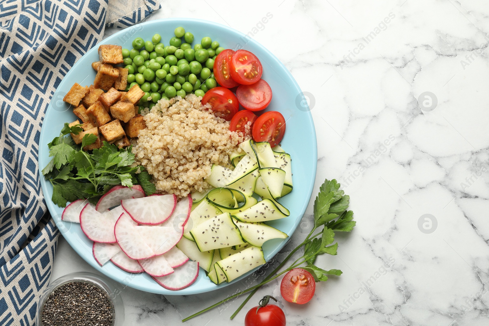 Photo of Different healthy vegetarian food served on white marble table, flat lay. Space for text