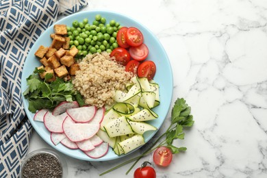 Photo of Different healthy vegetarian food served on white marble table, flat lay. Space for text