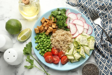 Photo of Different healthy vegetarian food served on white marble table, flat lay