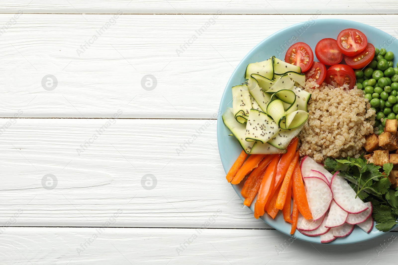 Different healthy vegetarian food on white wooden table, top view. Space for text Photo of Different healthy vegetarian food on white wooden table, top view. Space for text