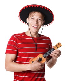 Photo of Smiling man in black Flamenco hat playing ukulele on white background