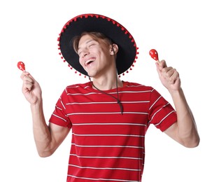 Photo of Happy man in black Flamenco hat playing maracas and singing on white background