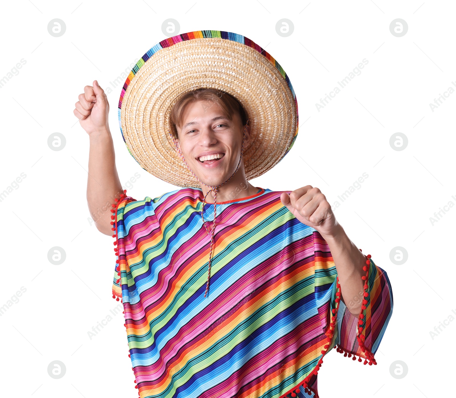 Smiling man in sombrero hat and colorful poncho dancing on white background Photo of Smiling man in sombrero hat and colorful poncho dancing on white background