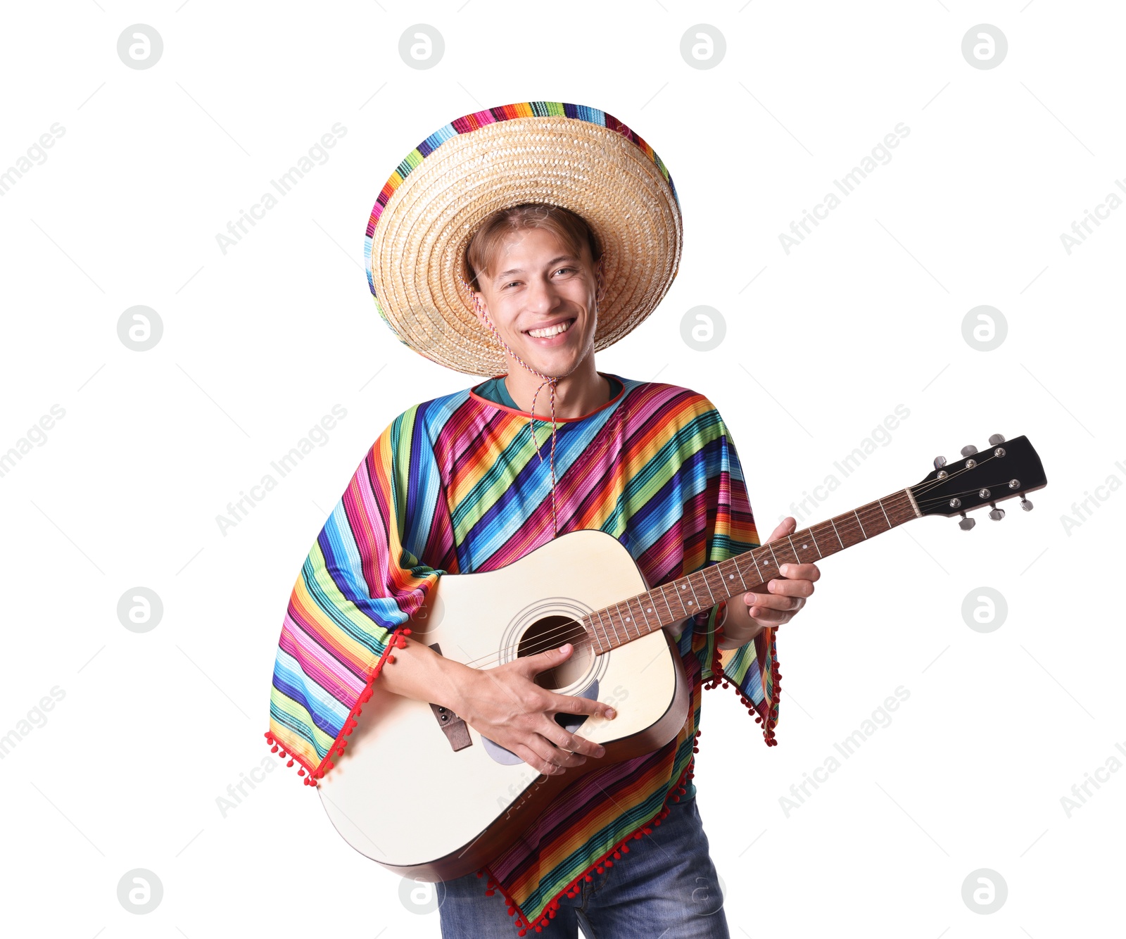 Smiling man in sombrero hat and colorful poncho playing guitar on white background Photo of Smiling man in sombrero hat and colorful poncho playing guitar on white background