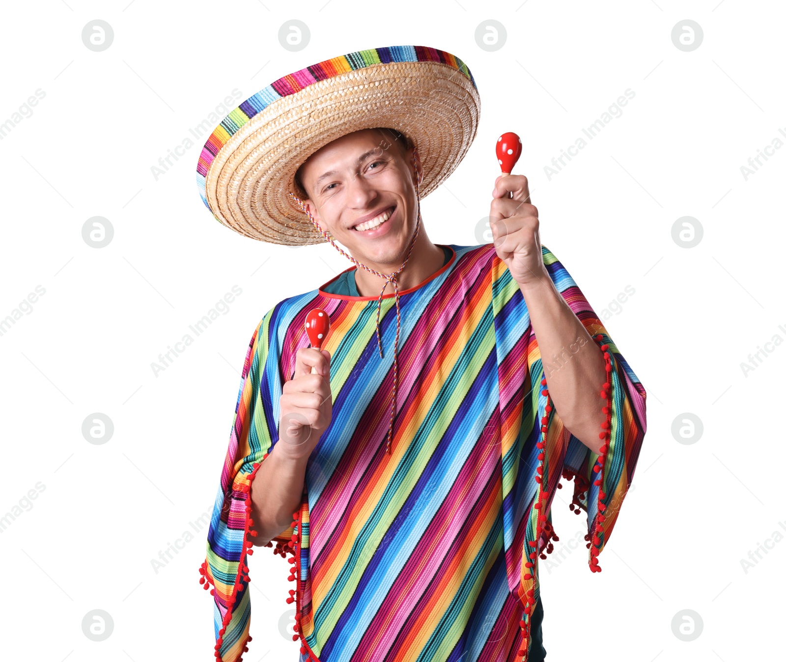 Smiling man in sombrero hat and colorful poncho playing maracas on white background Photo of Smiling man in sombrero hat and colorful poncho playing maracas on white background