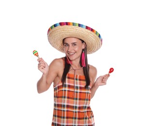 Photo of Smiling woman in sombrero hat playing maracas on white background