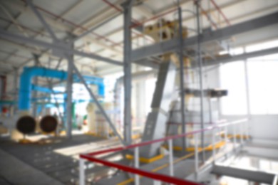 Image of Blurred view of modern granary with different equipment