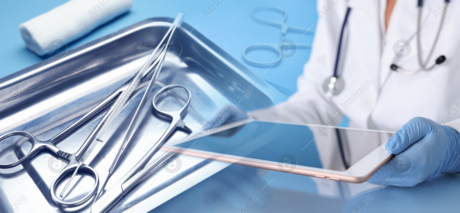 Doctor with tablet computer and surgical tools, double exposure. Banner design Image of Doctor with tablet computer and surgical tools, double exposure. Banner design
