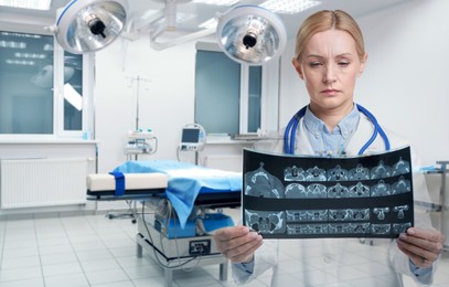 Image of Doctor examining x-ray image of paranasal sinuses and surgery room, double exposure