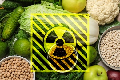 Image of Fresh vegetables, fruits, legumes and radioactive sign. Environmental contamination, polluted food
