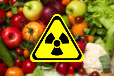 Image of Fresh vegetables, fruits and radioactive sign. Environmental contamination, polluted food