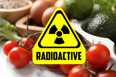 Image of Fresh vegetables on white marble table and radioactive sign. Environmental contamination, polluted food