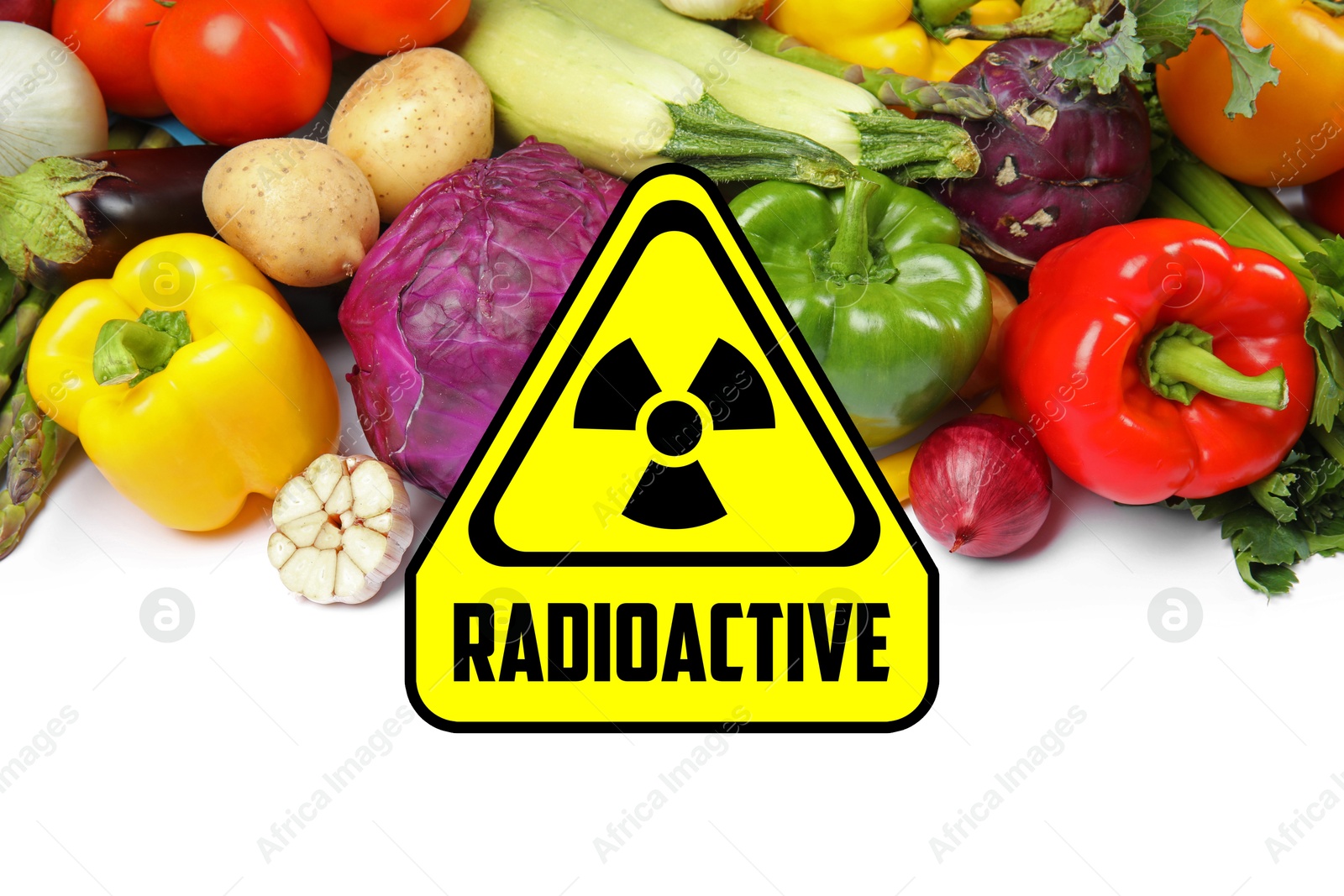 Image of Fresh vegetables and radioactive sign on white background. Environmental contamination, polluted food