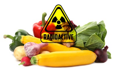 Image of Fresh vegetables and radioactive sign on white background. Environmental contamination, polluted food