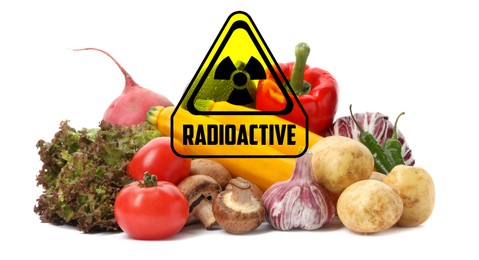 Image of Fresh vegetables and radioactive sign on white background. Environmental contamination, polluted food