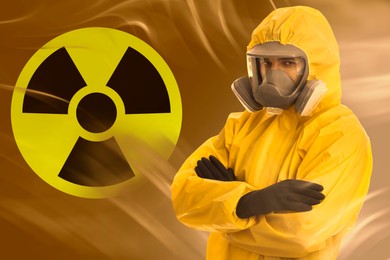 Image of Man wearing hazmat suit and gas mask in smoke. Radioactive sign on orange gradient background