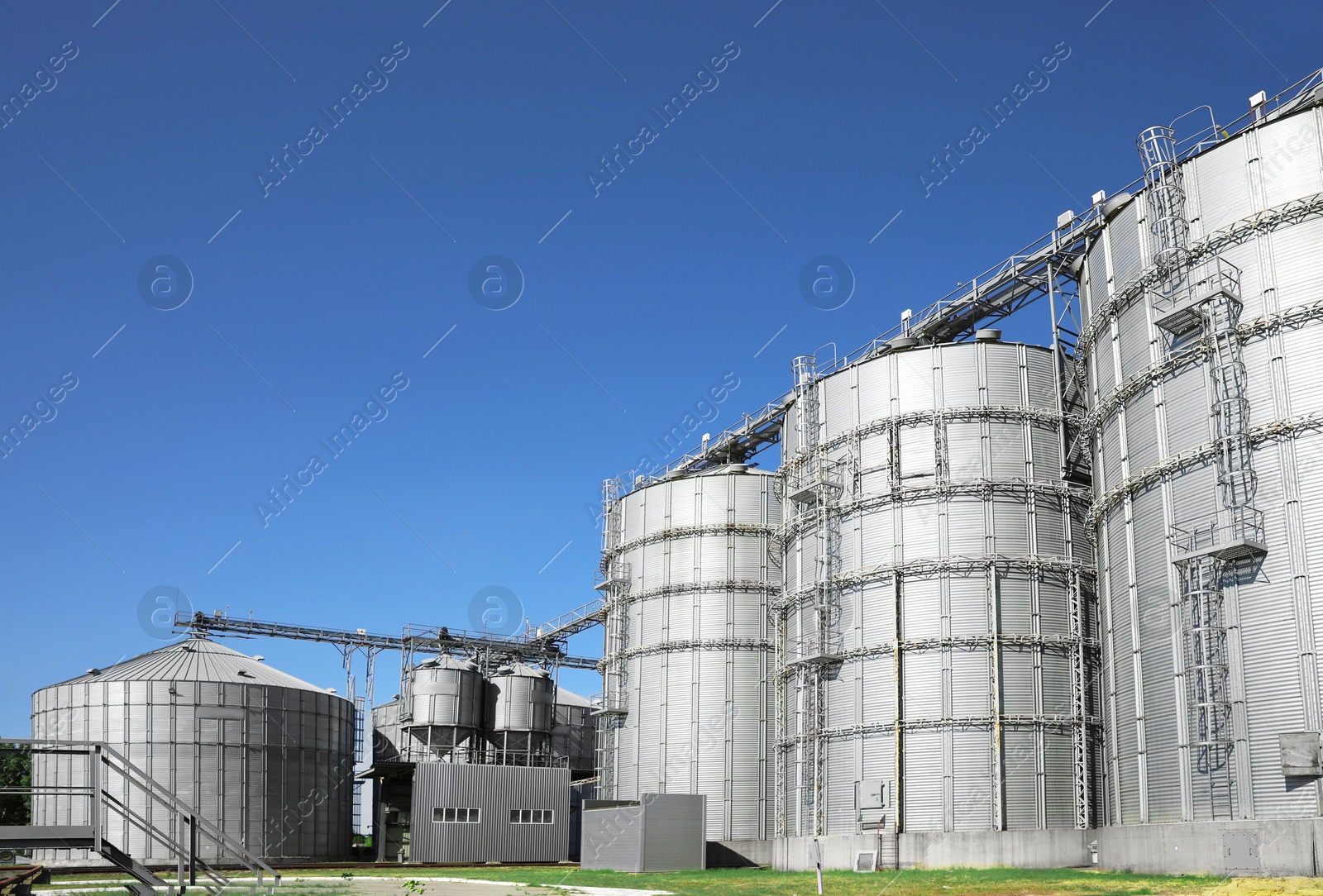 Modern granaries for storing cereal grains outdoors Image of Modern granaries for storing cereal grains outdoors