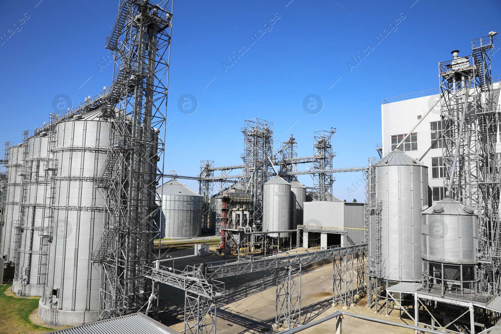 Modern granaries for storing cereal grains outdoors Image of Modern granaries for storing cereal grains outdoors