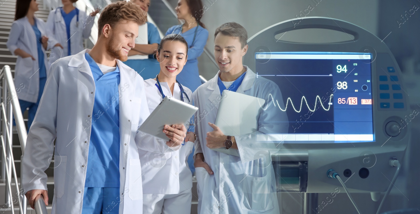 Group of doctors and medical heart rate monitor, double exposure. Banner design Image of Group of doctors and medical heart rate monitor, double exposure. Banner design