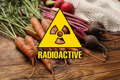 Image of Fresh vegetables on wooden table and radioactive sign. Environmental contamination, polluted food